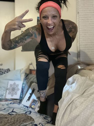Customer photo review of Salty Savage Ladies Mid Rise OG Smile Booty Scrunch Performance Leggings | OG SMILE KNEE LOGO EDITION | Wet Suit Performance | Black