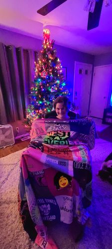 T-shirt quilt with family, celebration themes by Lisa from OH