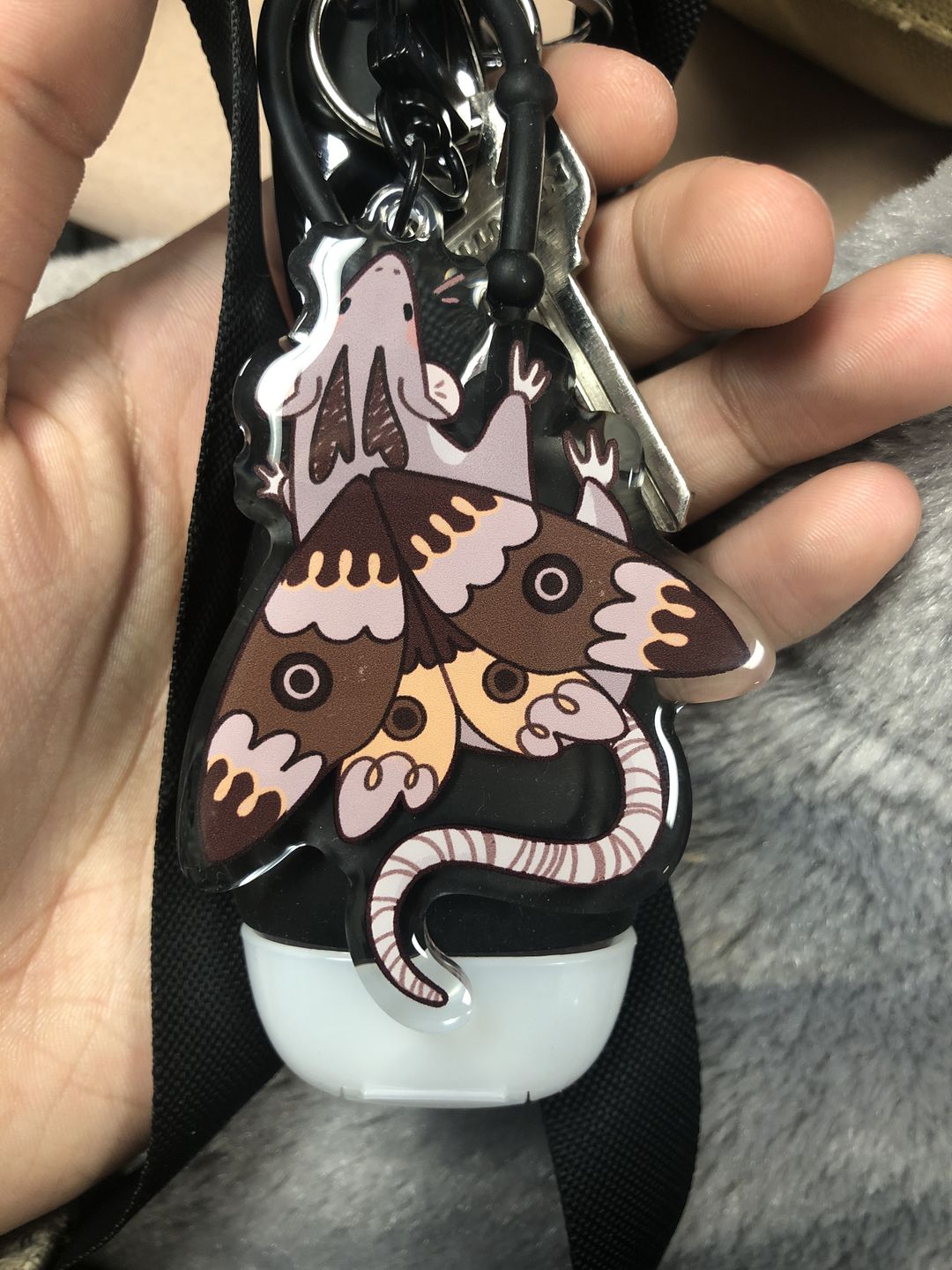 Customer photo review of Moth Rat Keychain