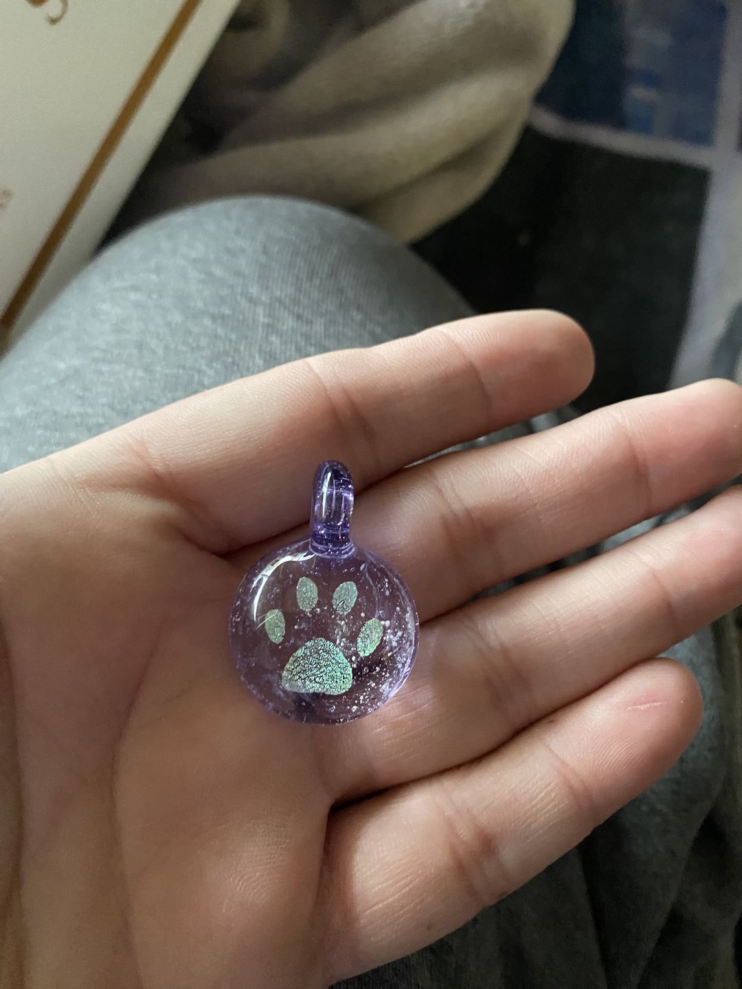 Customer photo review of Pawprint Foil Pendant with Cremation Ash