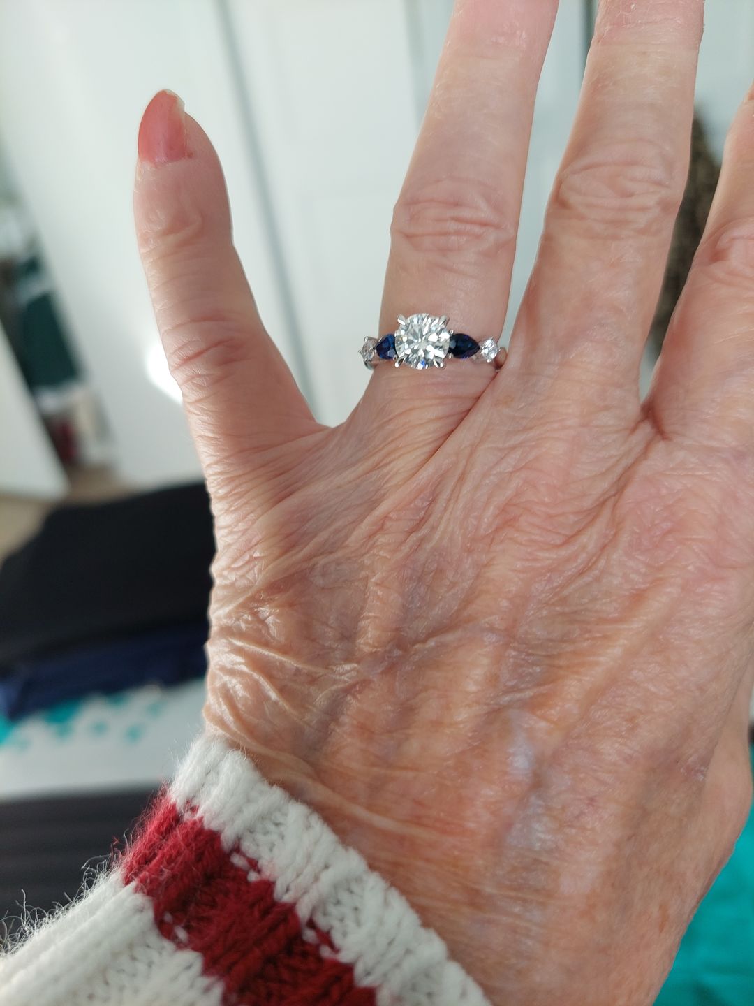 Customer photo review of Five Stone Moissanite And Sapphire Engagement Ring