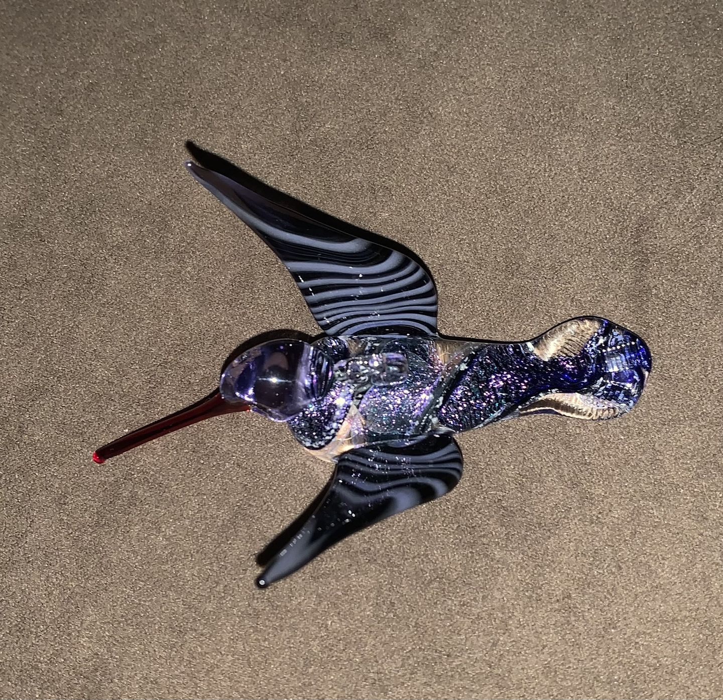 Customer photo review of Purple Dichroic Twist Glass Hummingbird with Infused Ash