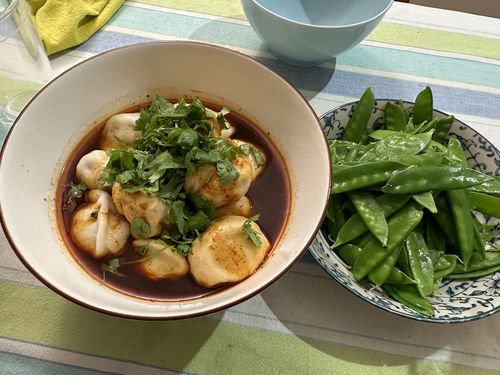 Customer photo review of Frozen [F8] Pork & Cabbage Dumplings w/ Spicy & Sour Sauces (30 Pieces/5 Servings)