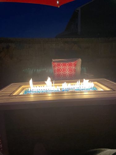 Customer photo review of Homrest 44in Fire Pit Table 50,000 BTU Auto-Ignition Propane Fire Pit Aluminum Hand-Painted Table Top, Brown