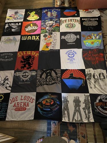 T-shirt quilt with music, concerts themes by Anne from CA