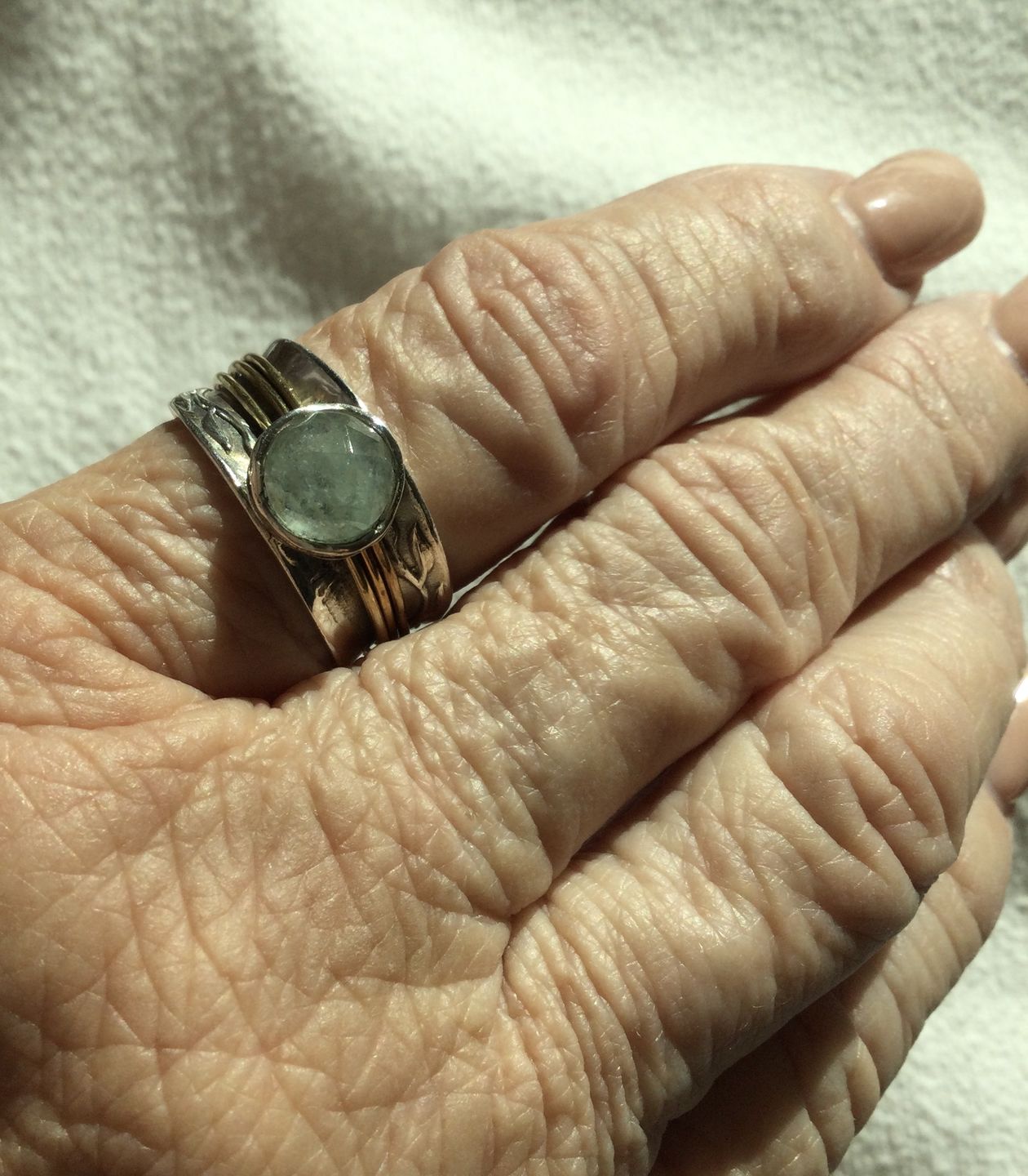 Customer photo review of Aquamarine Spinner Ring Inspired by Nature Sterling Silver