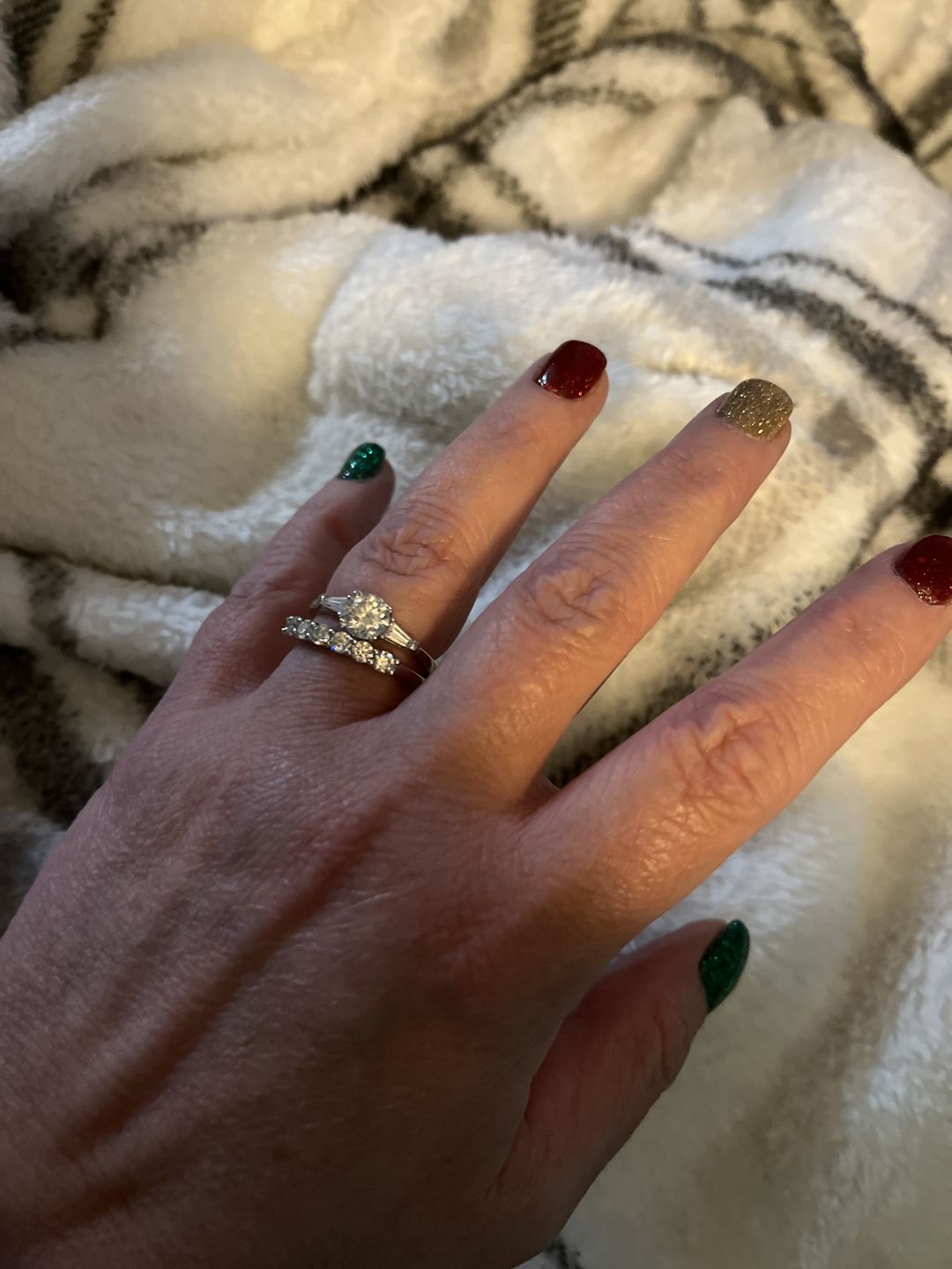 Customer photo review of Three Stone Round Moissanite Tapered Baguette Engagement Ring