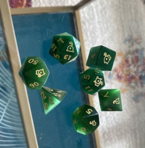 Customer photo review of Green Cat's Eye Gemstone DnD Dice Set Cat Butt Dice