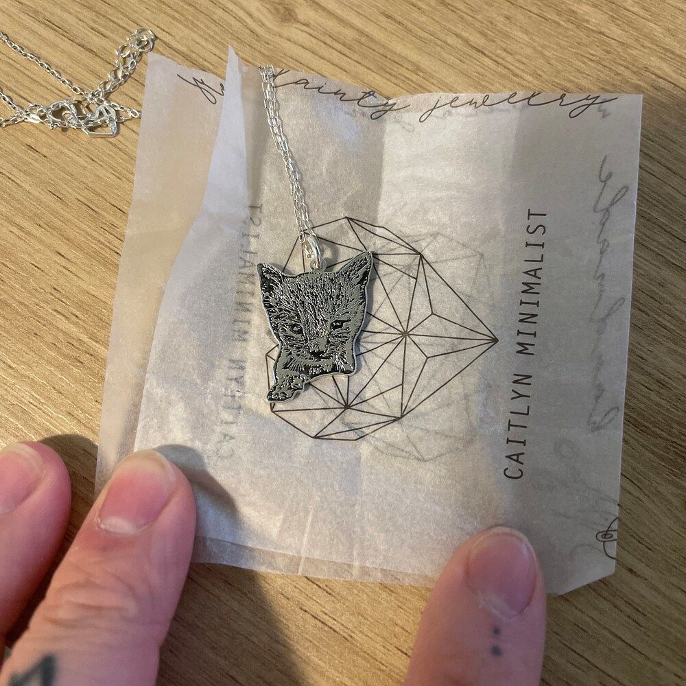Customer photo review of Personalized Silver Cat Necklace (925 Sterling Silver)