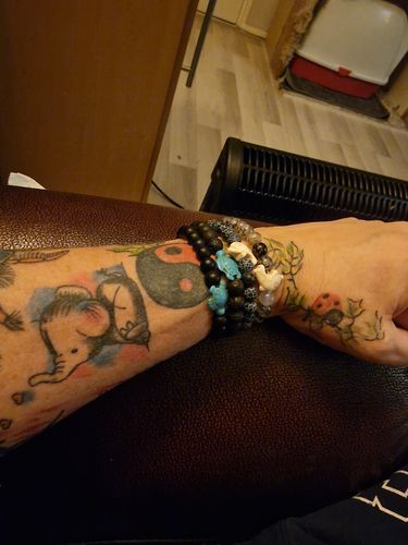 Customer photo review of "Dolphin" tracking bracelet