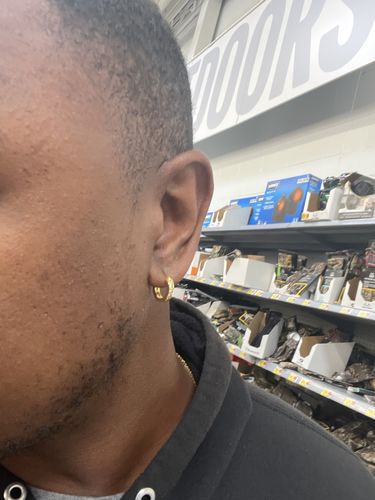Customer photo review of 18k Gold Finish Iced CZ Mini Hoop Earrings for Men