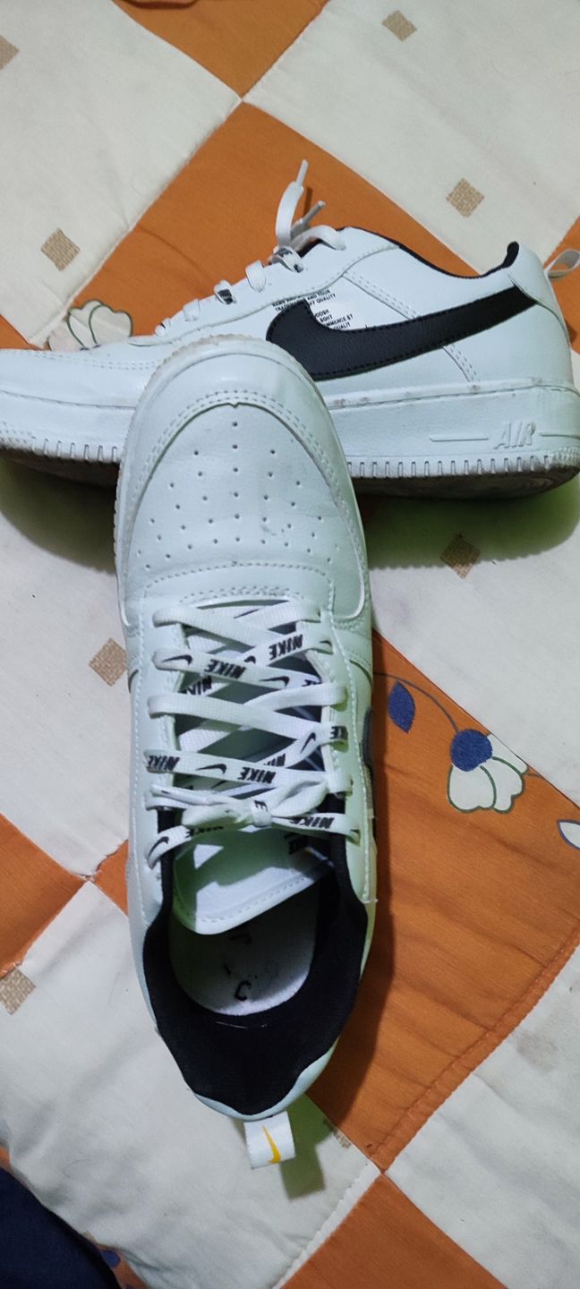 Customer photo review of Tenis 275 Blanco Negro
