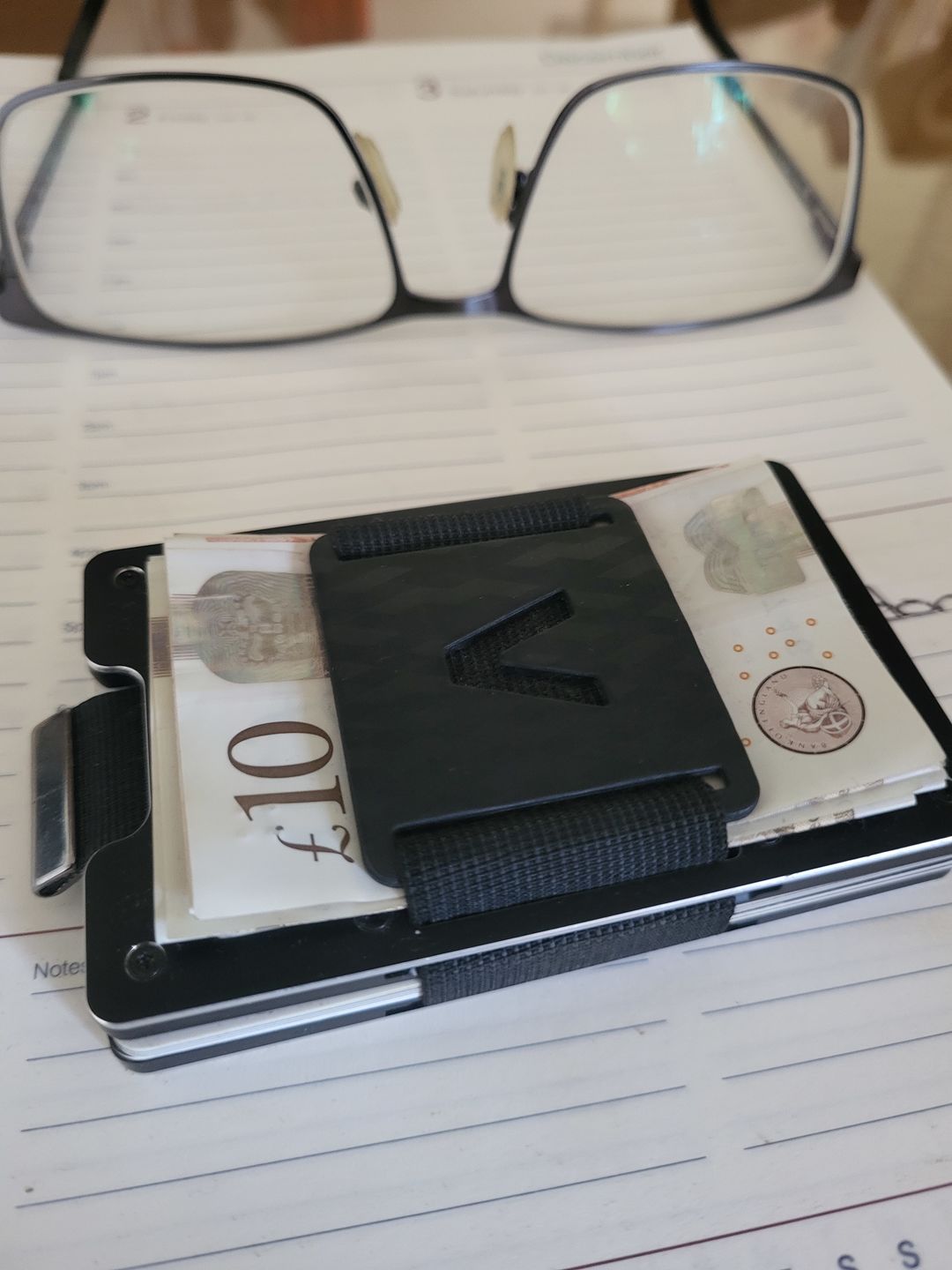 Customer photo review of Obsidian Black Metal Slim Wallet