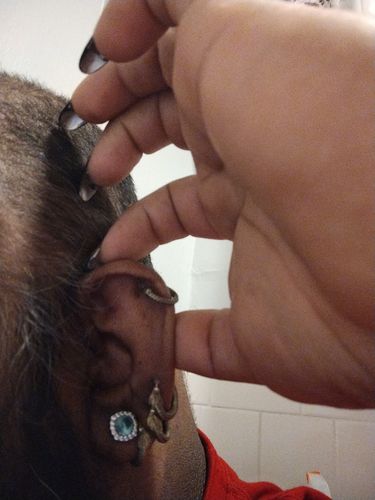 Customer photo review of Ouroboros Earrings