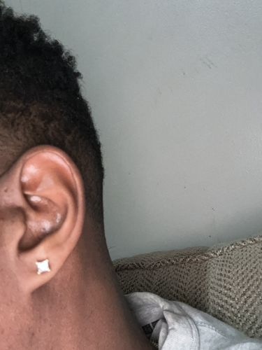 Customer photo review of VVS Moissanite Princess Cut Stud Earrings