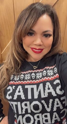 Customer photo review of Santa's Favorite Cabrona OG Navidad Sweatshirt