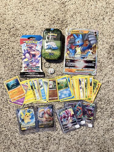 Customer photo review of Clutch Pokémon Mystery Holiday Gift Box