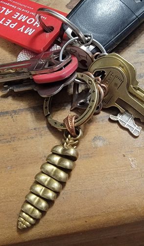 Customer photo review of Rattlesnake Tail Pendant
