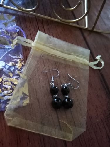 Customer photo review of Boucles d'oreilles pendantes doubles perles d'obsidienne oeil céleste