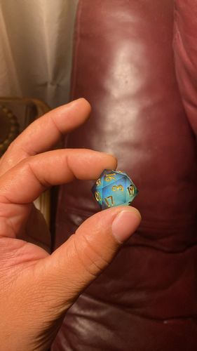 Customer photo review of Liquid Core Sharp Edge Resin DnD Dice Set Dark Teal Blue Dice