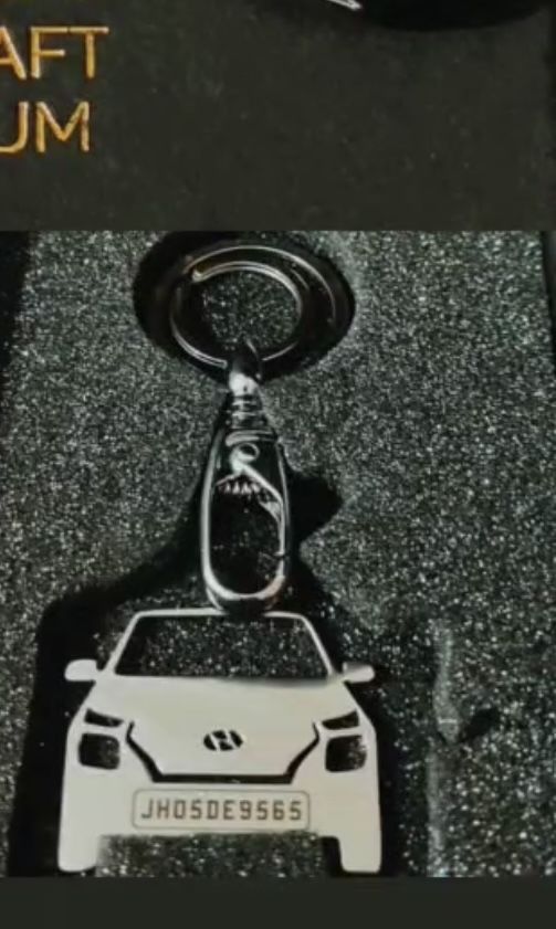 Customer photo review of Personalised Number Plate Car Keychain
