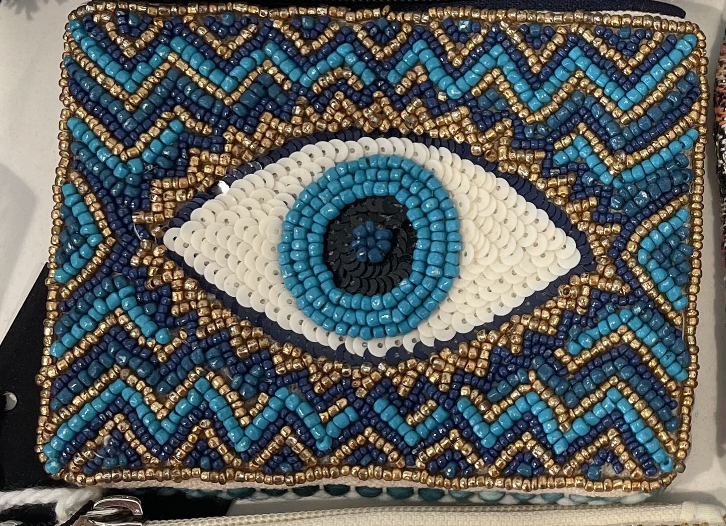 Customer photo review of Grecian Nights Evil Eye Embellished Mini Pouches