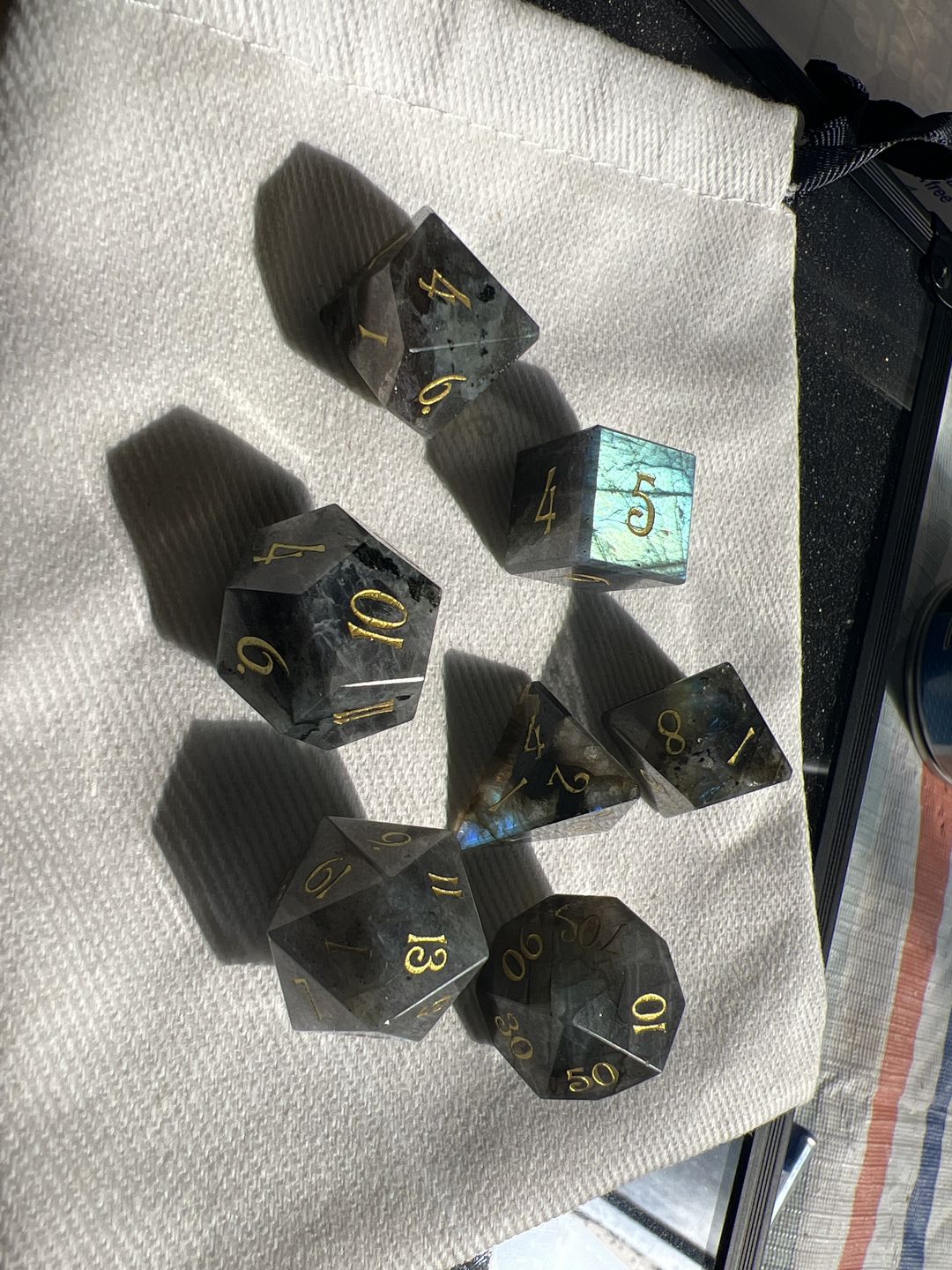 Customer photo review of URWizards D&D Labradorite Gemstone Engraved Dice Set