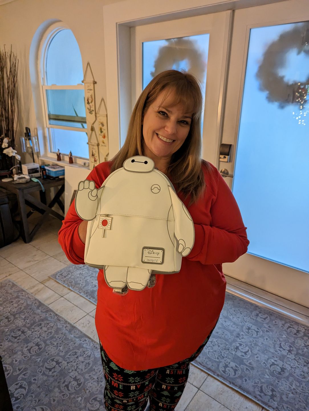 Customer photo review of 707 Street Exclusive - Loungefly Disney Glow in the Dark Talking Baymax Mini Backpack