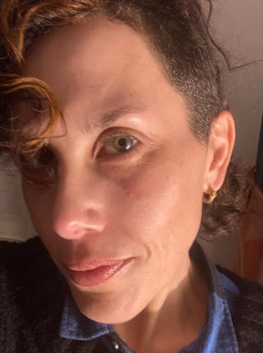 Customer photo review of Ouroboros Earrings