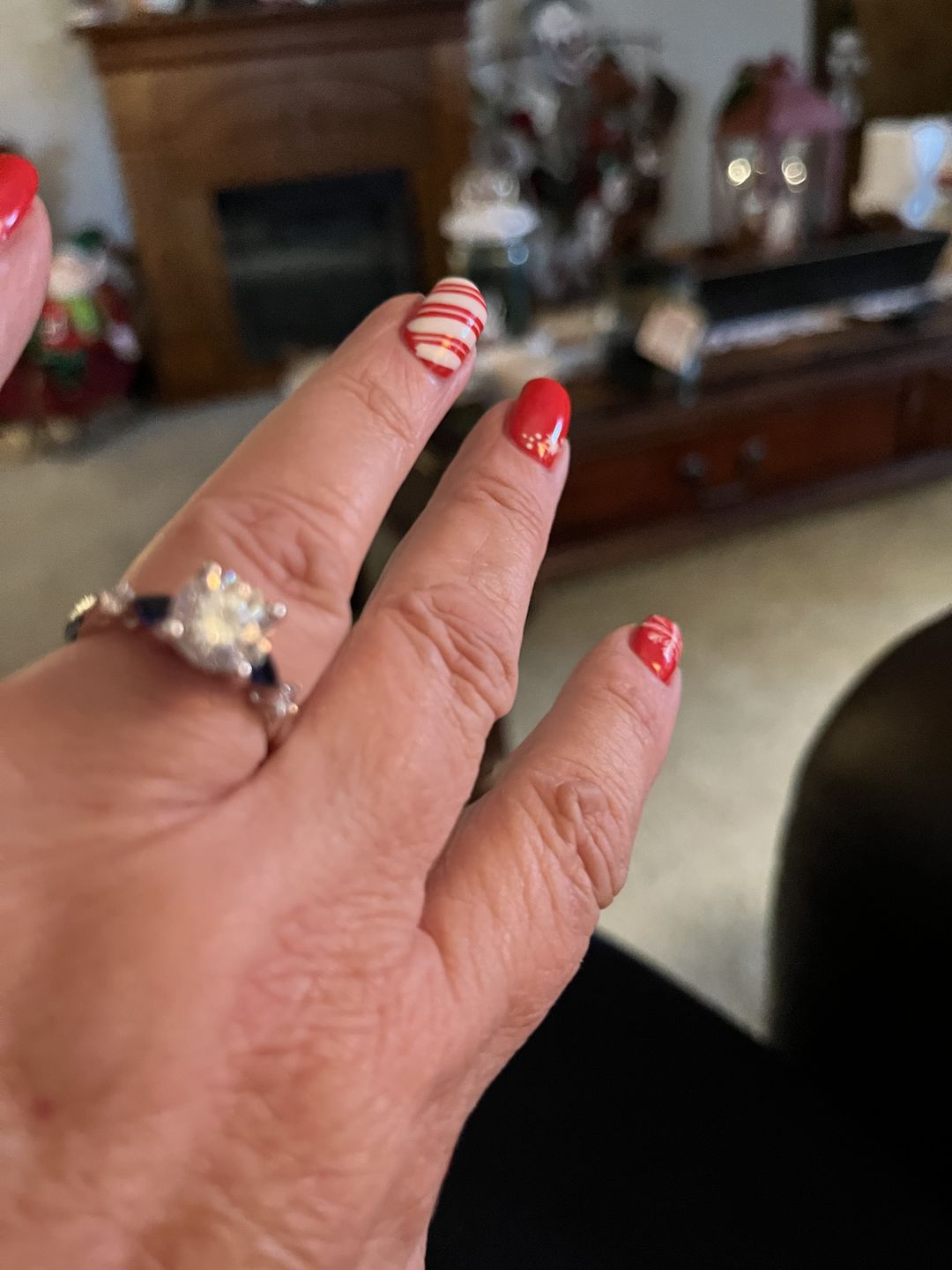 Customer photo review of Five Stone Moissanite And Sapphire Engagement Ring