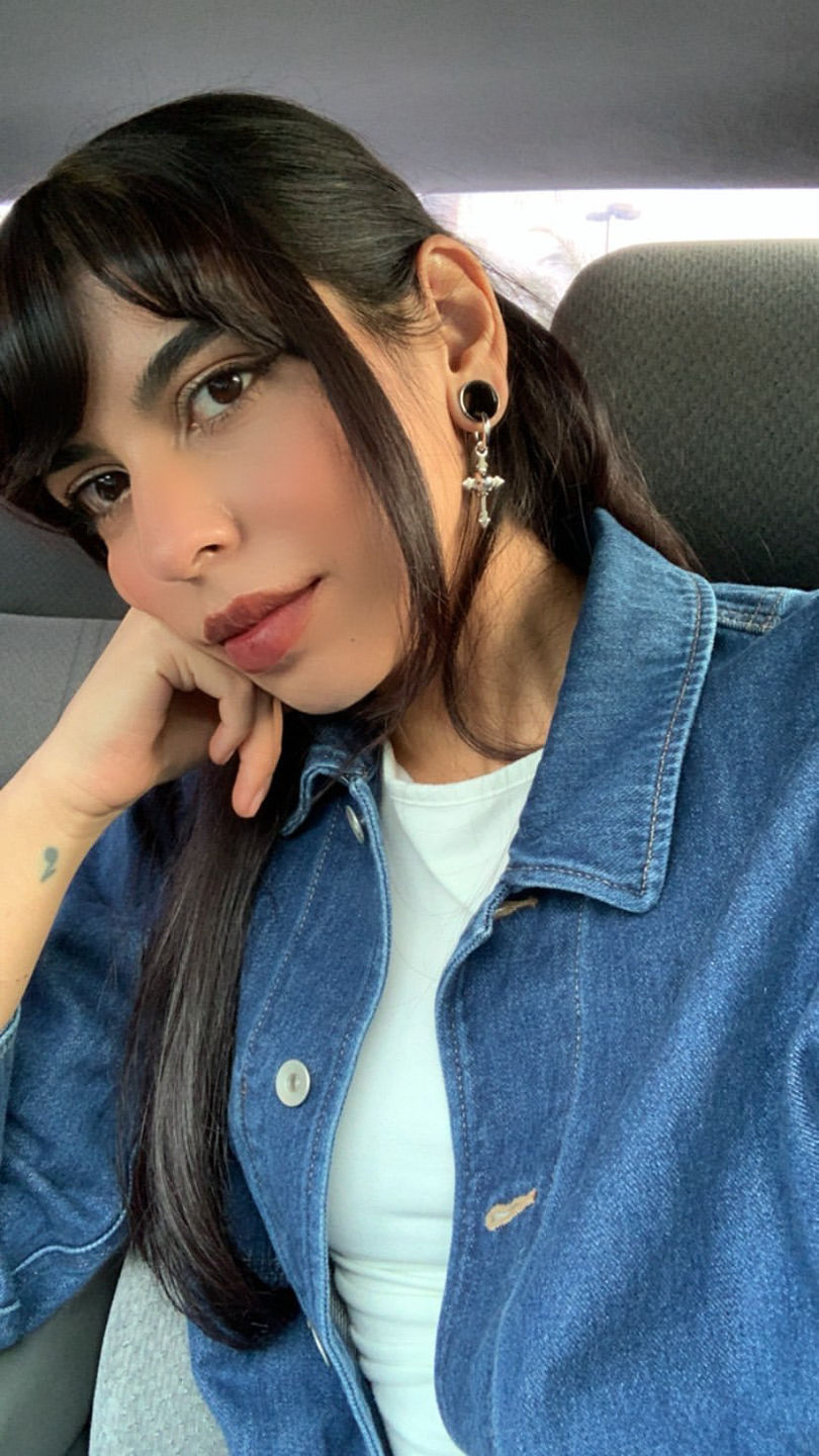 Customer photo review of DOWN YOUR THROAT EARRING
