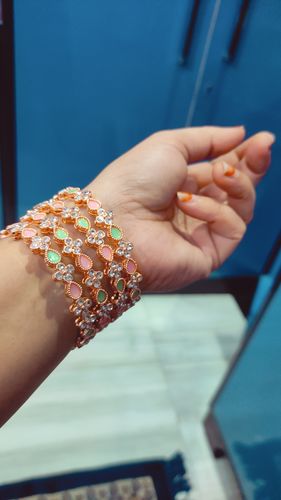 Customer photo review of Rubans Rose Gold Plated Pastel Stone Studded Floral Set Of 4 Bangles