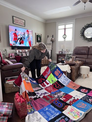 T-shirt quilt featuring high school sports teams by Amy from PA