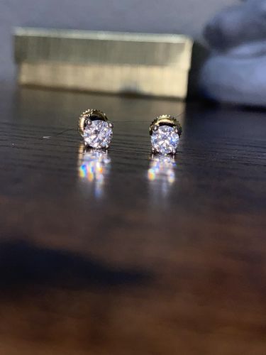 Customer photo review of VVS Moissanite Solitaire Stud Earrings