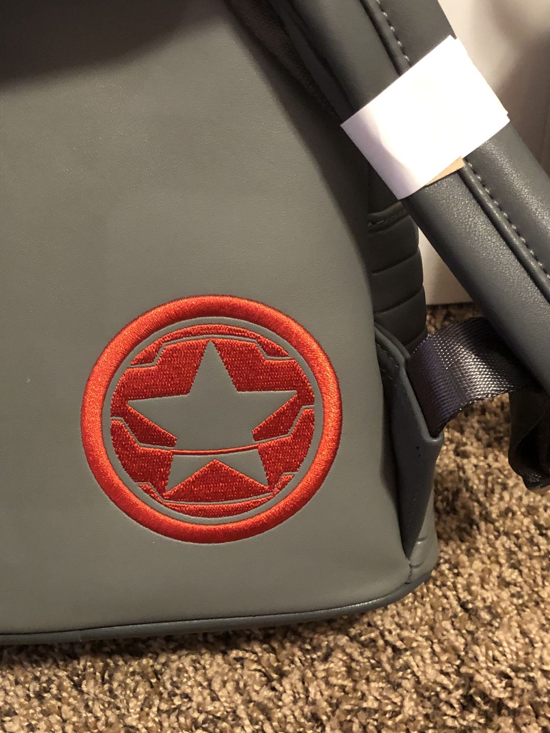 Customer photo review of Loungefly Marvel Winter Soldier Cosplay Mini Backpack