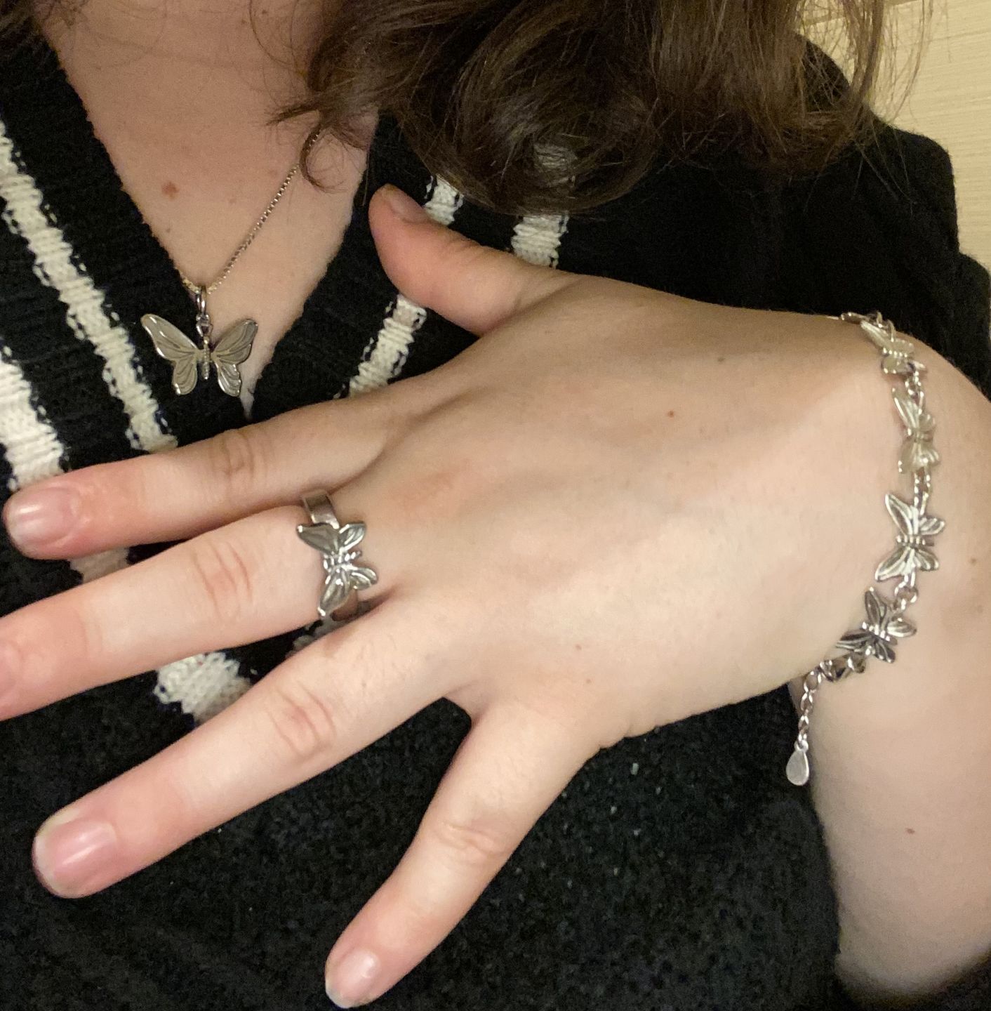 Customer photo review of BUTTERFLY EARRING (STUD)