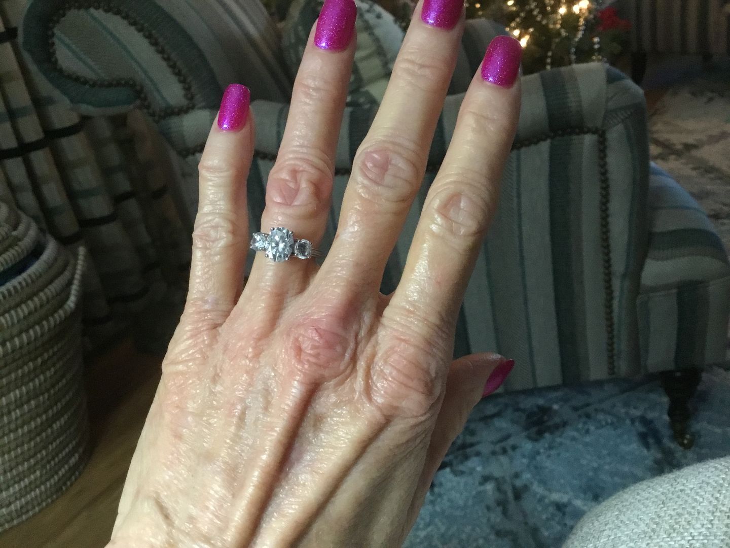 Customer photo review of Three Stone Oval Moissanite Channel-Set Engagement Ring