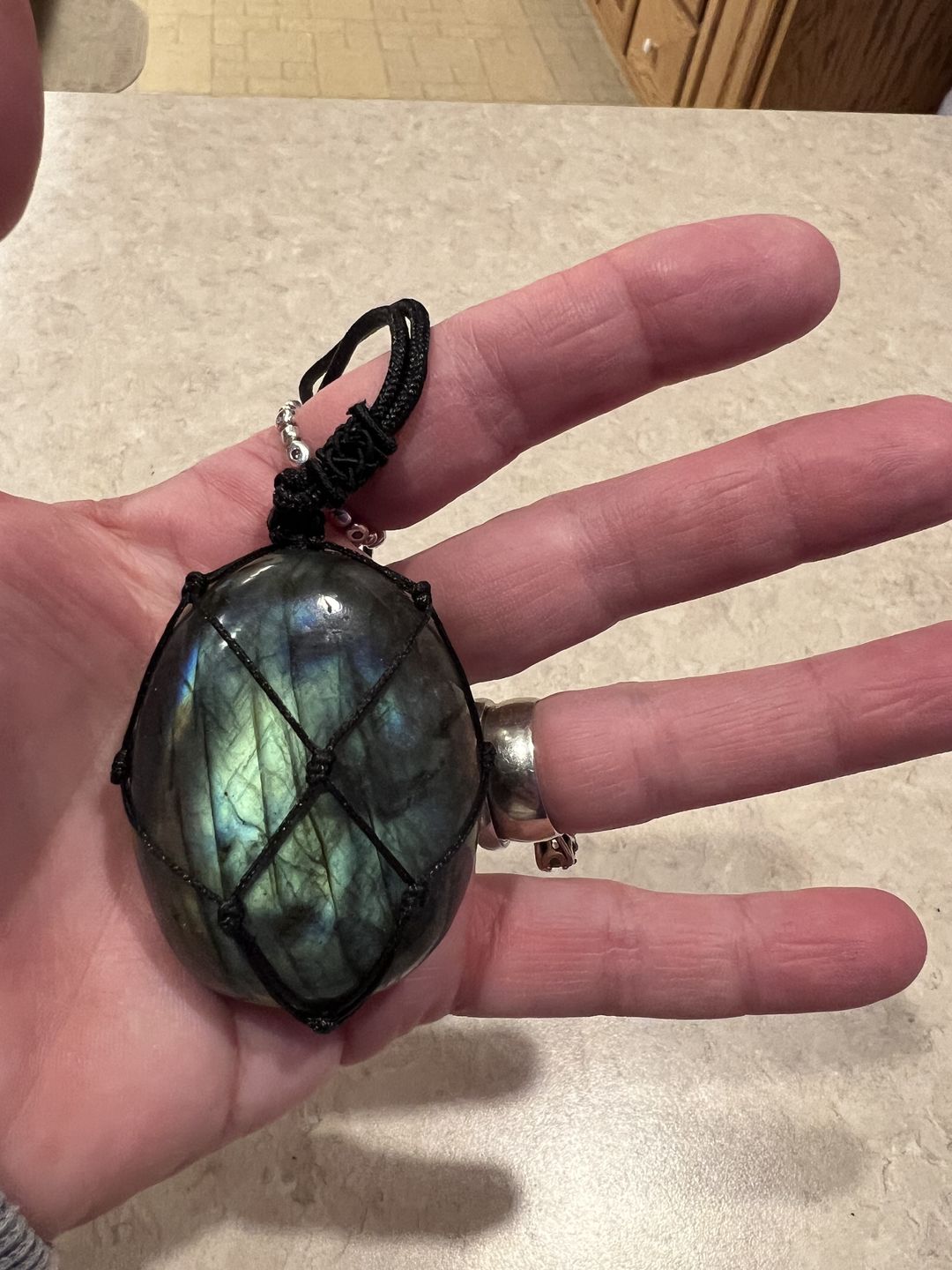 Customer photo review of Dragon's Heart Labradorite Necklace