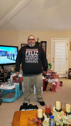 Customer photo review of Feliz Navidad Putos OG Navidad Sweatshirt