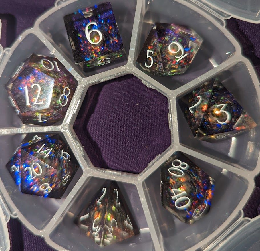 Customer photo review of URWizards D&D Resin Engraved Dice Set The Galaxy