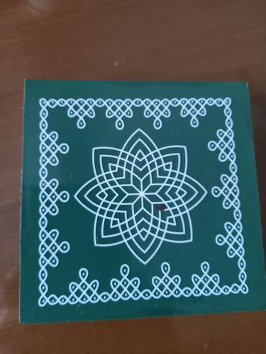 Customer photo review of Lotus Rangoli Wooden Stand /  Chakram Design  Kolam Manai / For Lamps / Deities/ Decoration- 6 inches