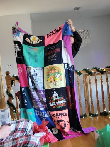 T-shirt quilt with travel, dance themes by Mary Ellen from NJ