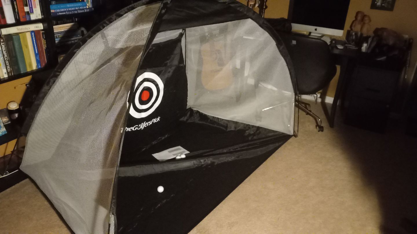 Customer photo review of Golf Practice Driving Net for Indoors and Outdoors | Tri-Turf Hitting Mat