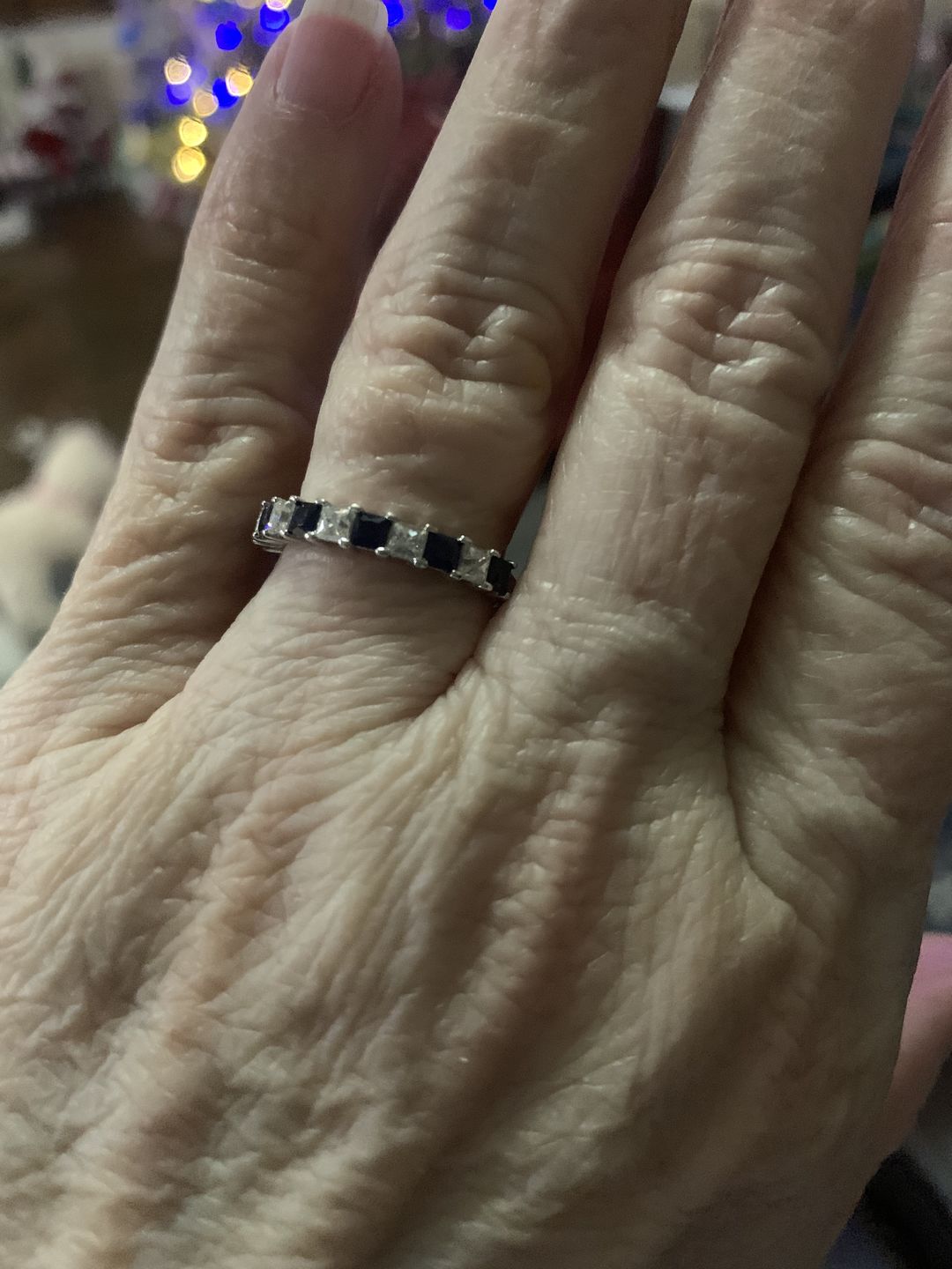 Customer photo review of Alternating Princess Moissanite And Sapphire Half Eternity Wedding Band Ring