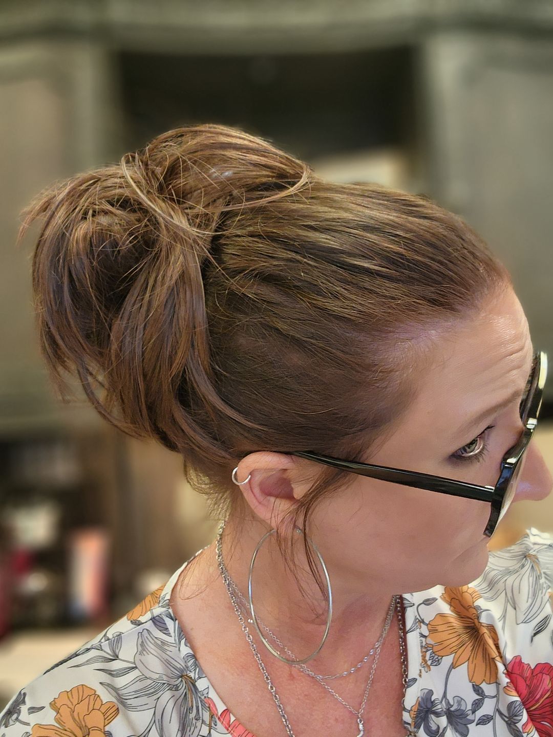 A JuvaBun customer wearing the Straight Hair Bun