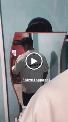 Customer video review of 'Dreamers' Cream Oversized Tee