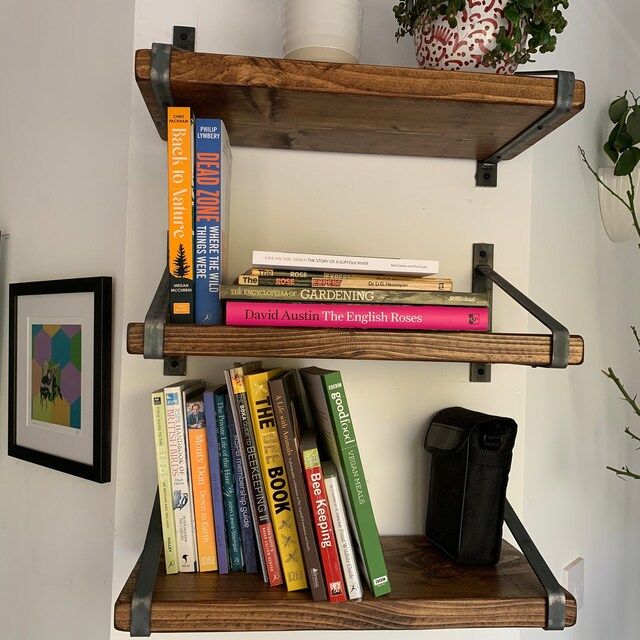 Customer photo review of Rustic Wooden Wall Shelves with Triangle Metal Wall Brackets