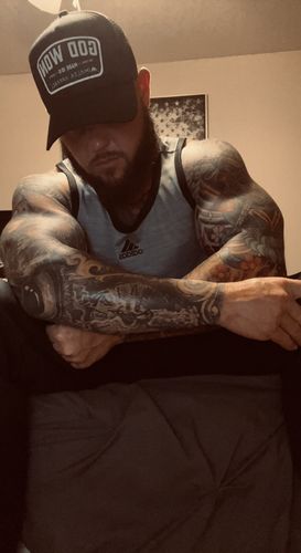 Customer photo review of Black ‘God Won’ Trucker Hat - Black Patch