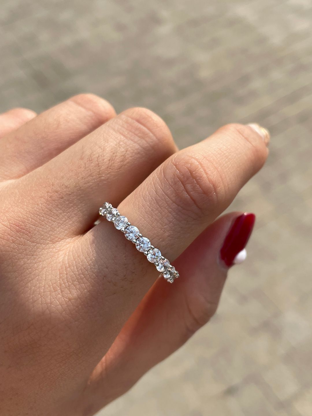 Customer photo review of Louily Eternity Round Cut Simulated Diamond Wedding Band In Sterling Silver