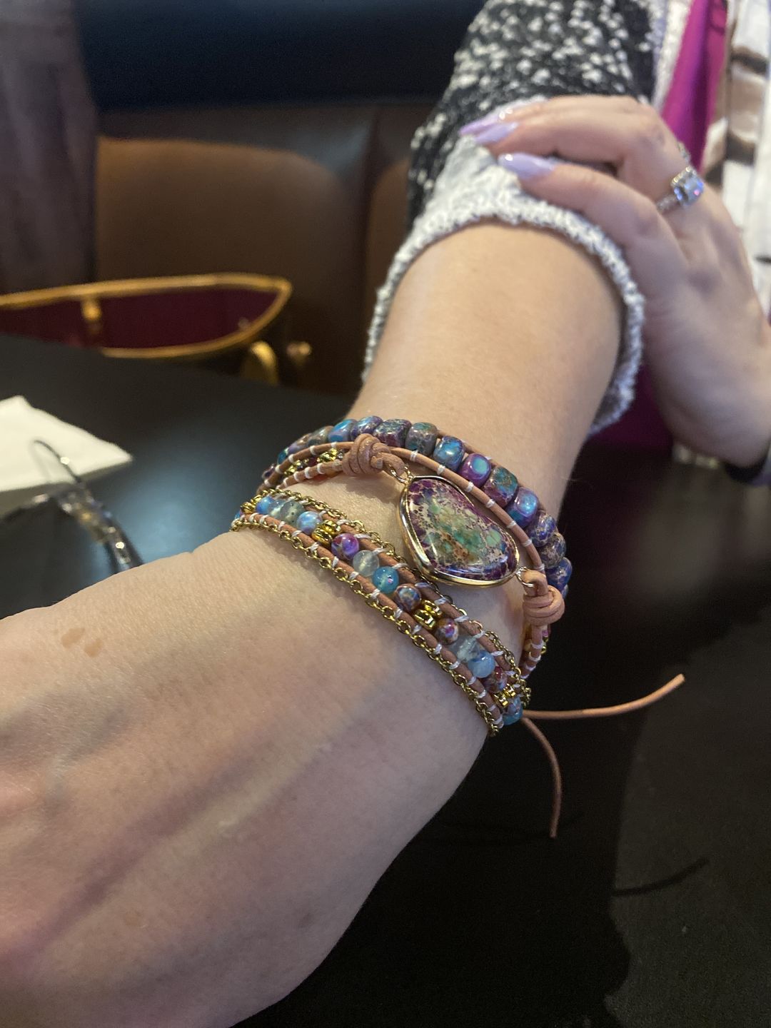 Customer photo review of Wanderlust Tie Dye Heart Bracelet